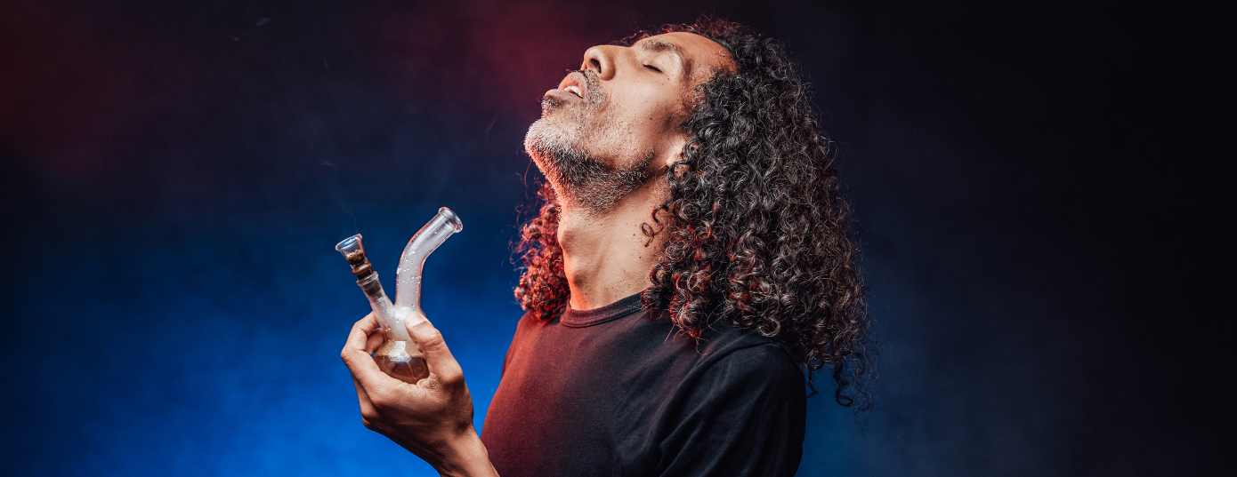 man with a bong in hand