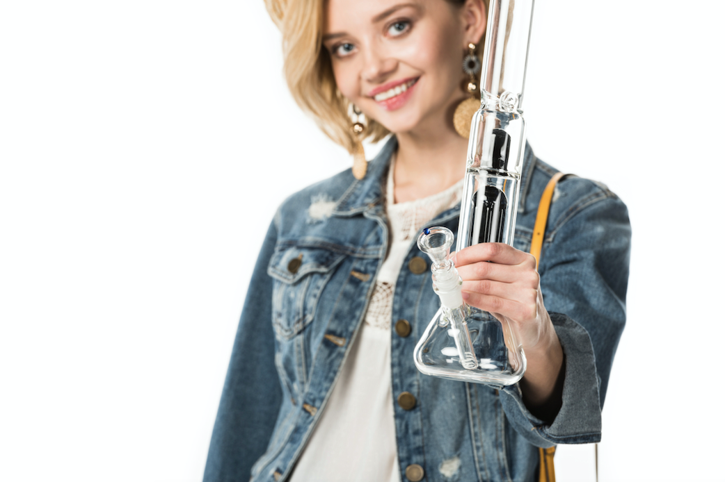 Woman holding a bong
