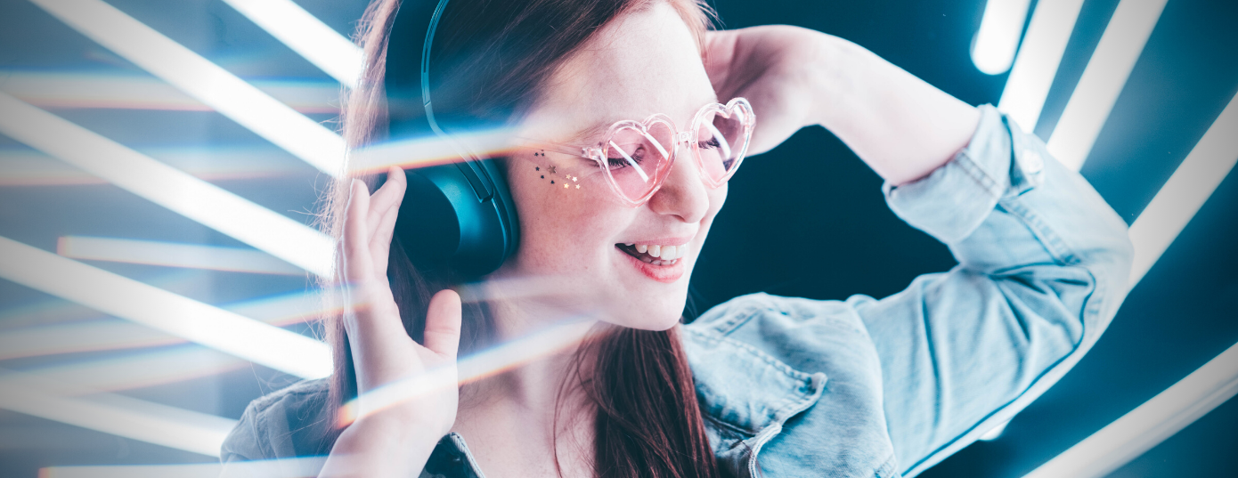 young woman listening music while high