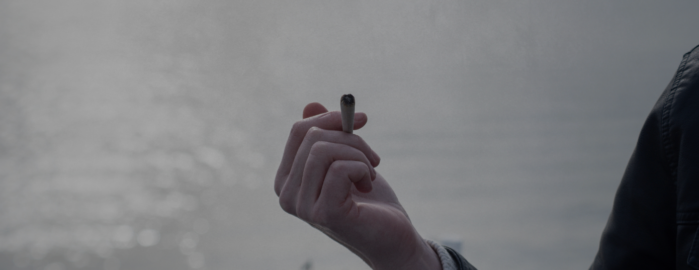 man with joint in hand