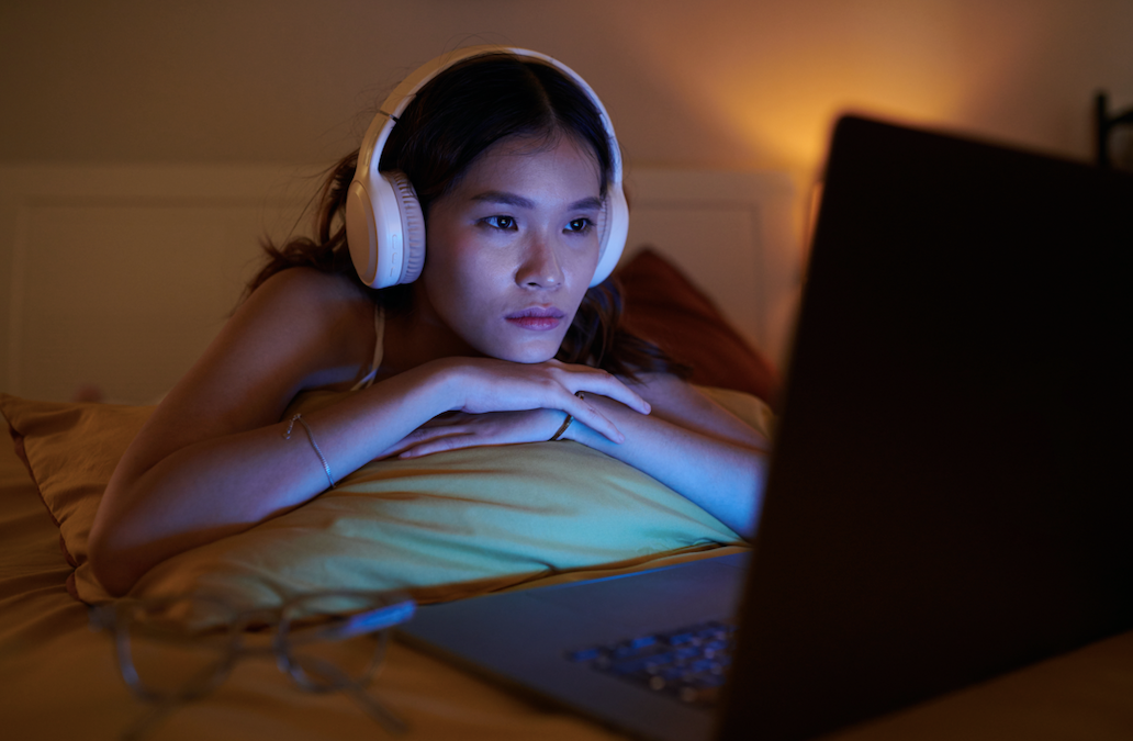woman watching cannabis documentaries online