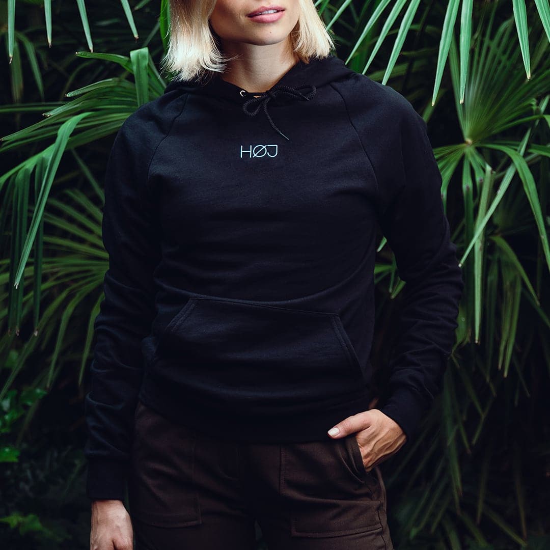 woman with black HØJ hoodie