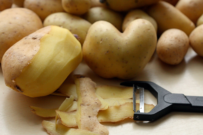 Peeled potato to make a potato pipe