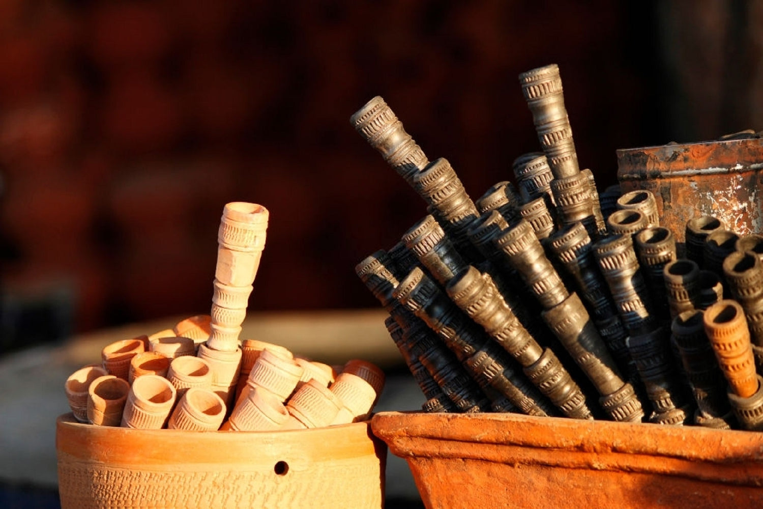 Clay and metal chillum pipes