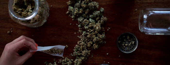 hand making a weed joint