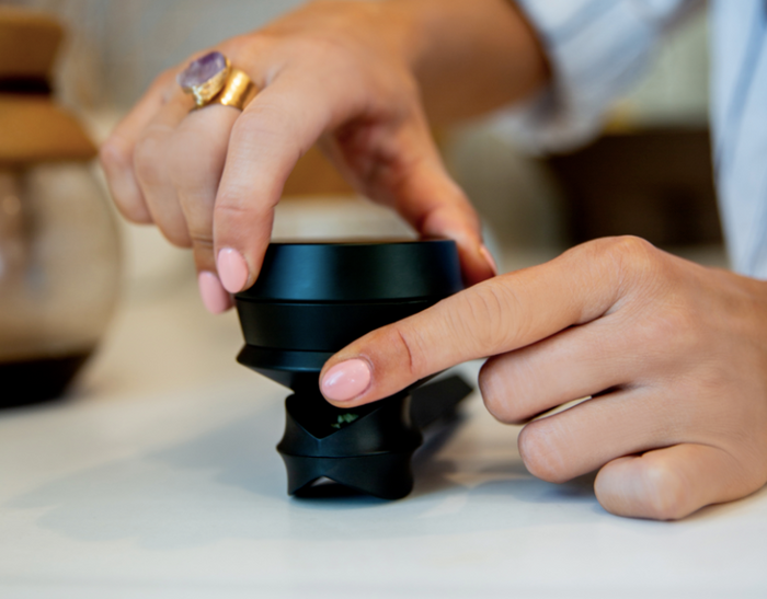 Transfering weed from a grinder to a pipe with a funnel