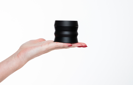 hand holding KLIP 4 piece grinder