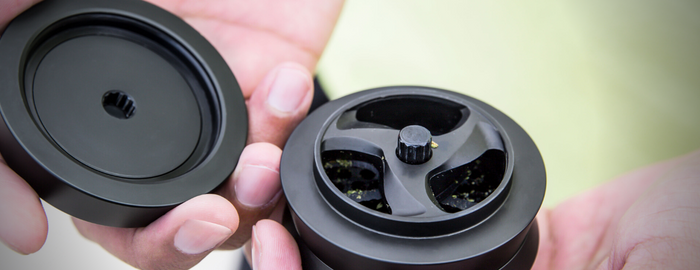 weed grinder open in hands