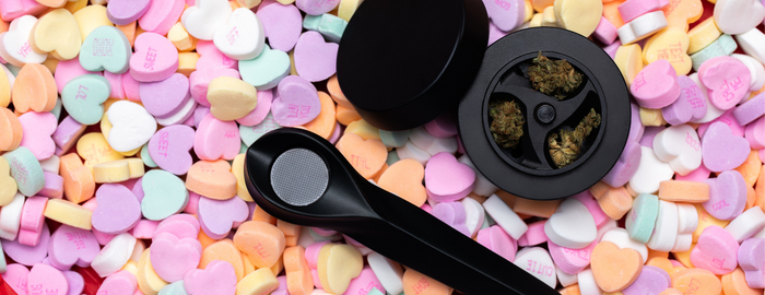 pipe and weed grinder in a valentines background