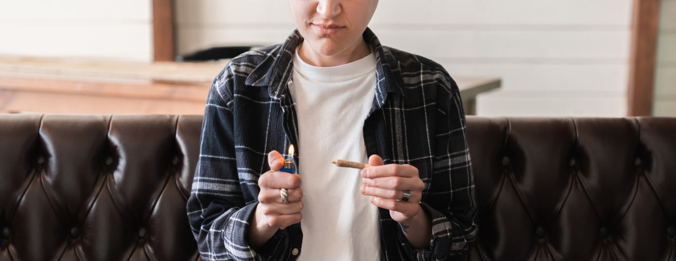 woman lighting up a joint