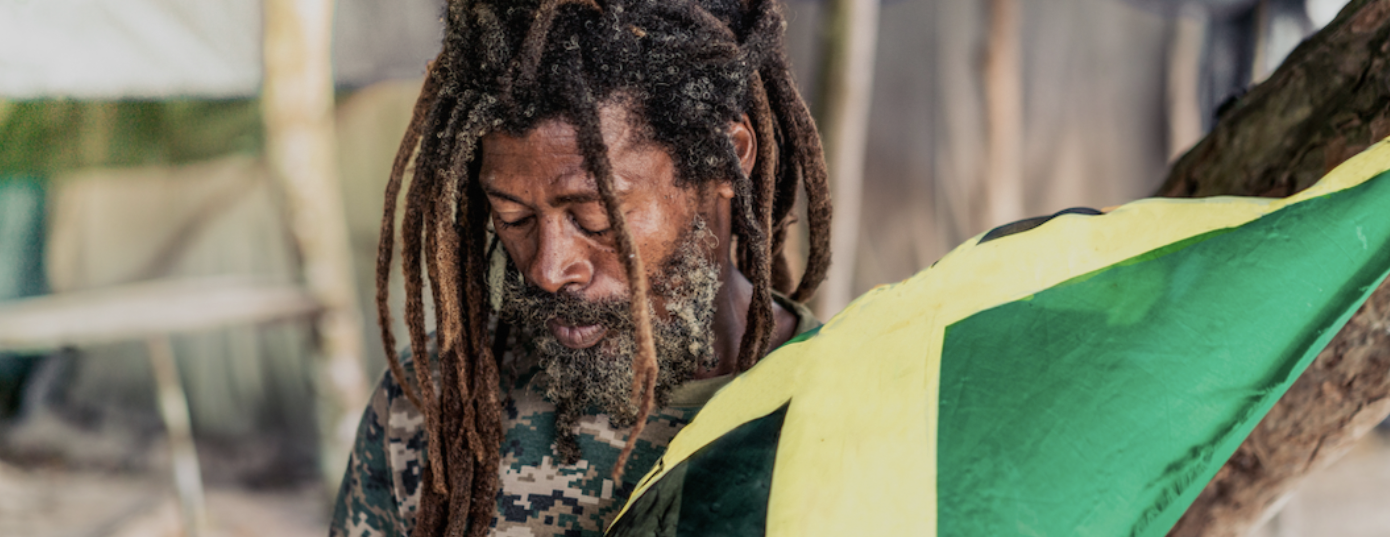 Rastafari man with Jamaica flag