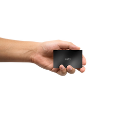 hand with HØJ black gift card