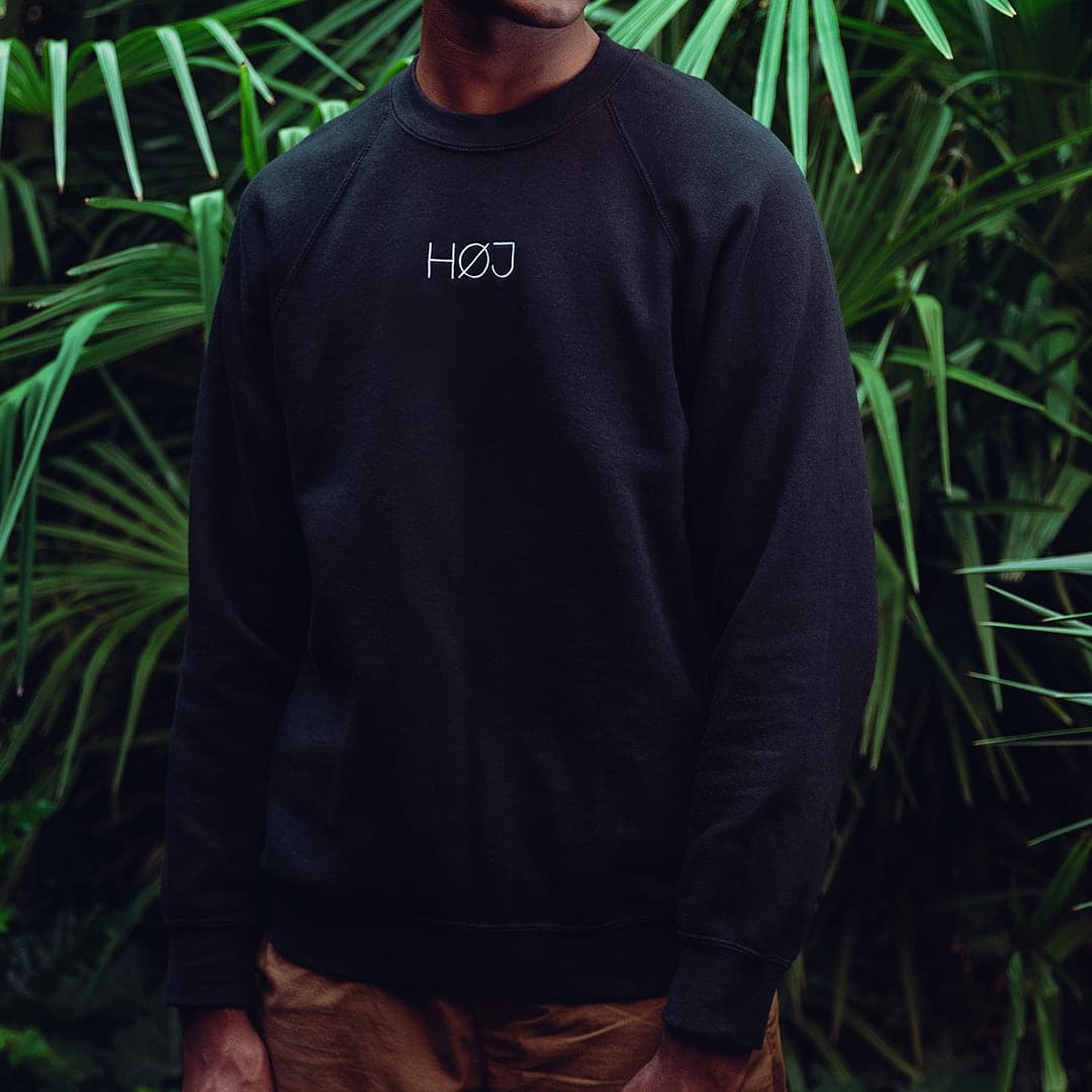 Man with black HOJ sweatshirt 