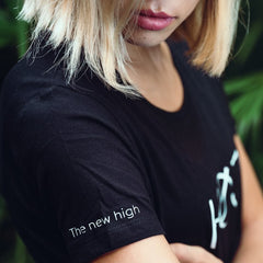Blonde woman with black HOJ tshirt 