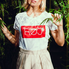 Blonde woman with white HOJ tshirt 